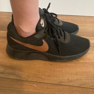 Women’s Size 7.5 Black and Gold Nike